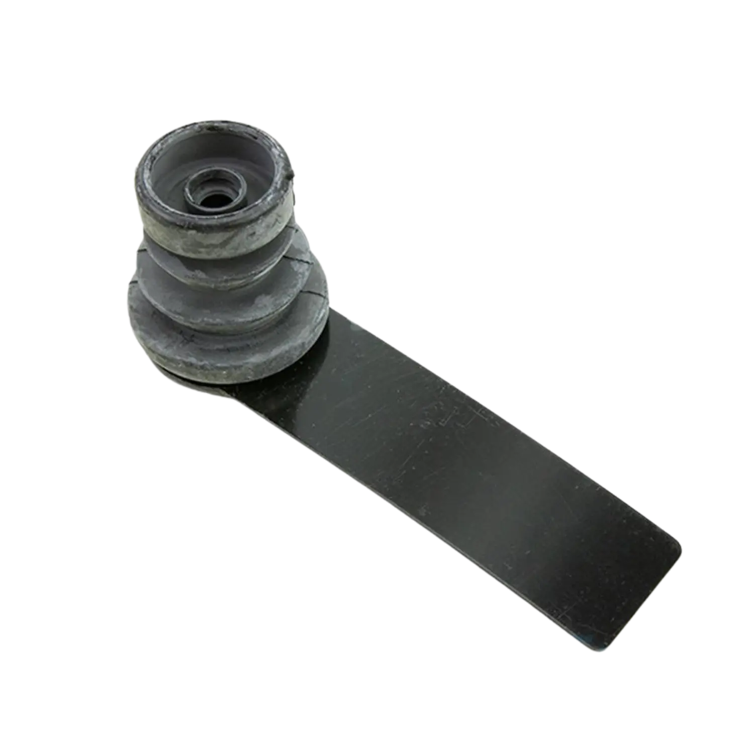 Flexible Gummiblende für Schreckschussrevolver, graue Gummiform mit einer flachen, schwarzen Metallplatte.