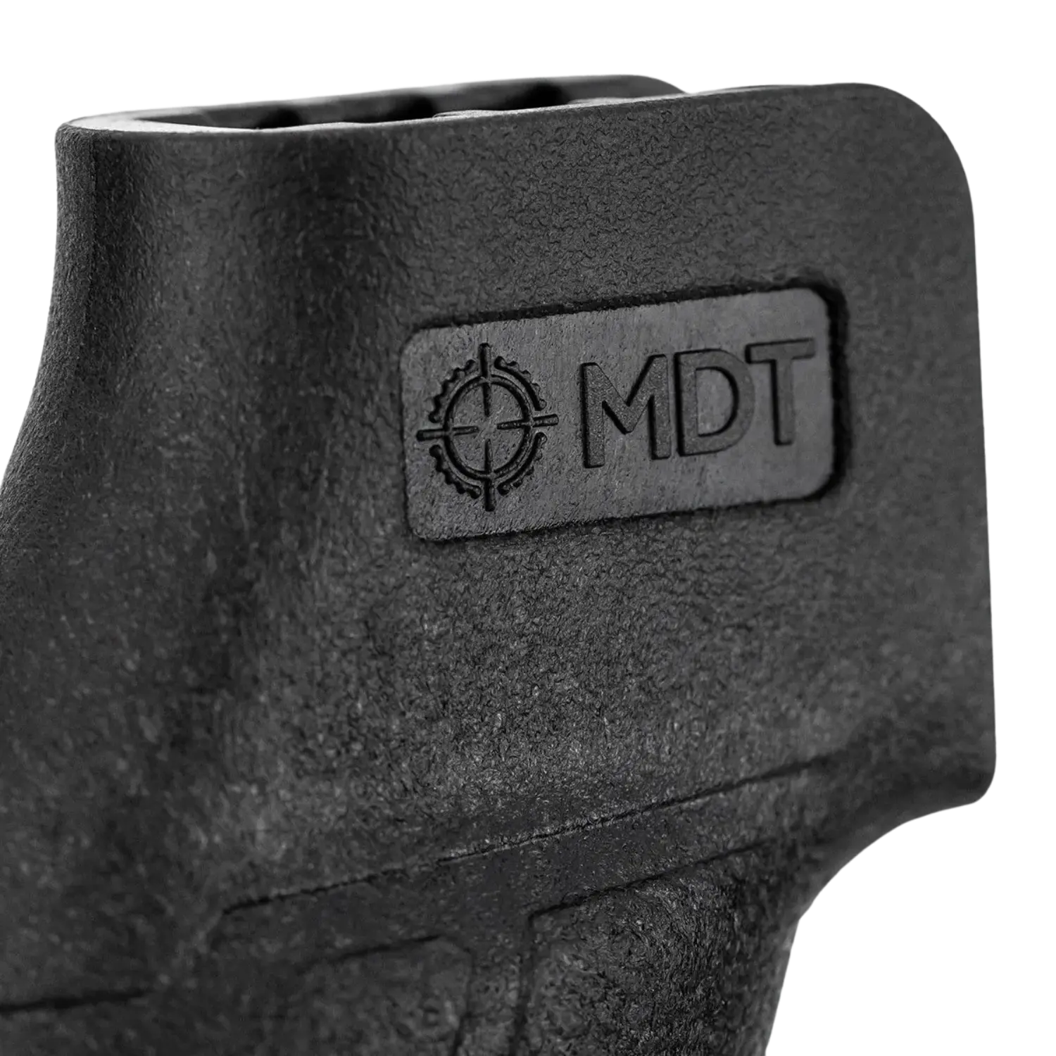 Schwarzer Pistolengriff mit rauer Oberfläche und eingeprägtem Logo 'MDT' mit Zielscheiben-Symbol.
